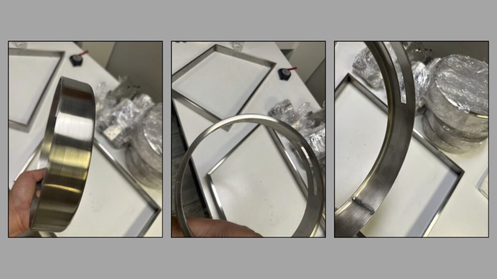 Close-up of stainless steel rings and components used in scenic fabrication projects at Alice Scenic Studios.