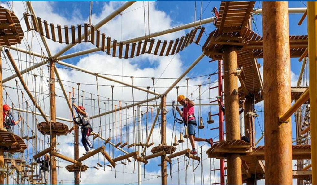 Outdoor ropes course built with custom scenic fabrication and themed structural design by Alice Scenic Studios